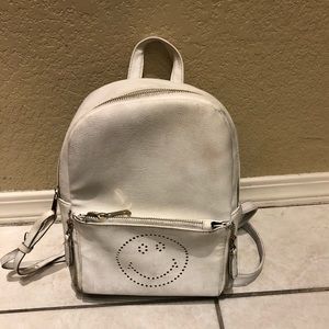 Faux leather smiley face backpack